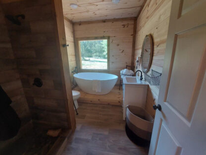 Cabin restroom with pedestal tub